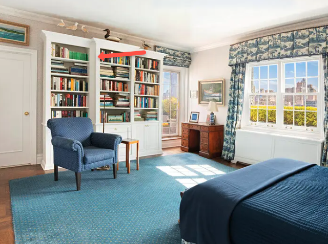 Loeb editions in a top shelf of a bedroom.